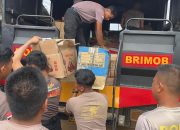 Brimob Polda Sumut Bersama Dinas Pendidikan Tapanuli Tengah Salurkan Bantuan Perlengkapan Sekolah ke Sekolah Darurat