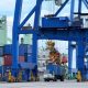 Aktivitas bongkar muat petikemas di PT Kaltim Kariangau Terminal menggunakan alat modern side loader di Balikpapan.